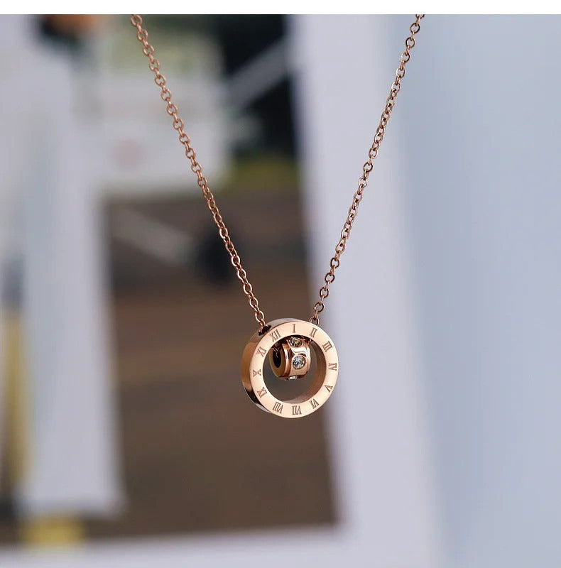 Time Necklace with Emerald in Gold